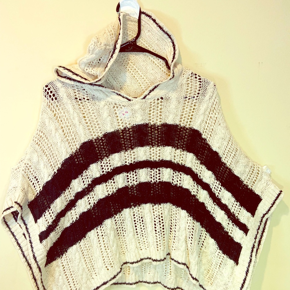 Poncho that is black and tan for kids